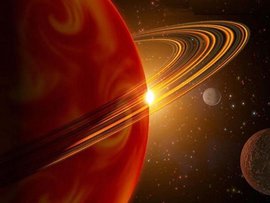 Астрономы озадачены красными дугами на спутнике Сатурна 